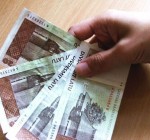 Полиция Латвия арестовывает за финансовые советы