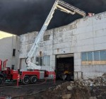 С места пожара в Алитусе планируется начать вывоз опасных отходов