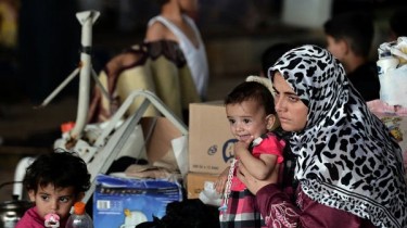 В Литву из Греции прибыли ещё 12 беженцев из Сирии и один апатрид из Палестины
