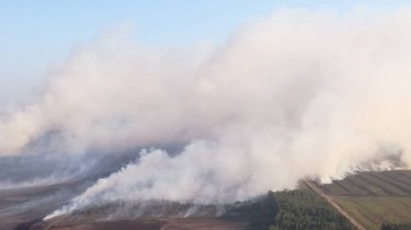 Литовский военный вертолёт тушит пожар в Латвии (дополнено)