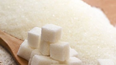 Правоохрана: в Литву тоннами завозили из Польши сахар и масло без уплаты НДС