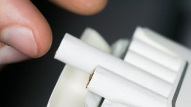 Аналитик: сокращение нелегальных сигарет вызвано и ростом доходов (дополнено)