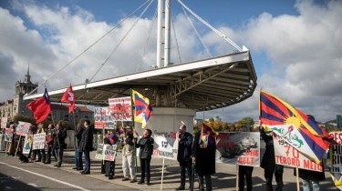 В день 70-летия КНР участники протеста в Вильнюсе предупреждают об угрозах от этой страны
