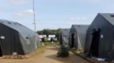 СОГГ Литвы: мигранты переселены из палаточного городка в Швендурбе